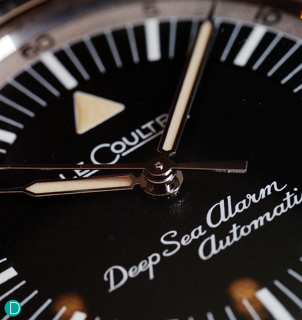 Close up of the dial. The LeCoultre name on the dial shows this is the US version, where for many years, JLC was known as LeCoultre. Note also the beautiful scrip writings Deep Sea Alarm Automatic,.