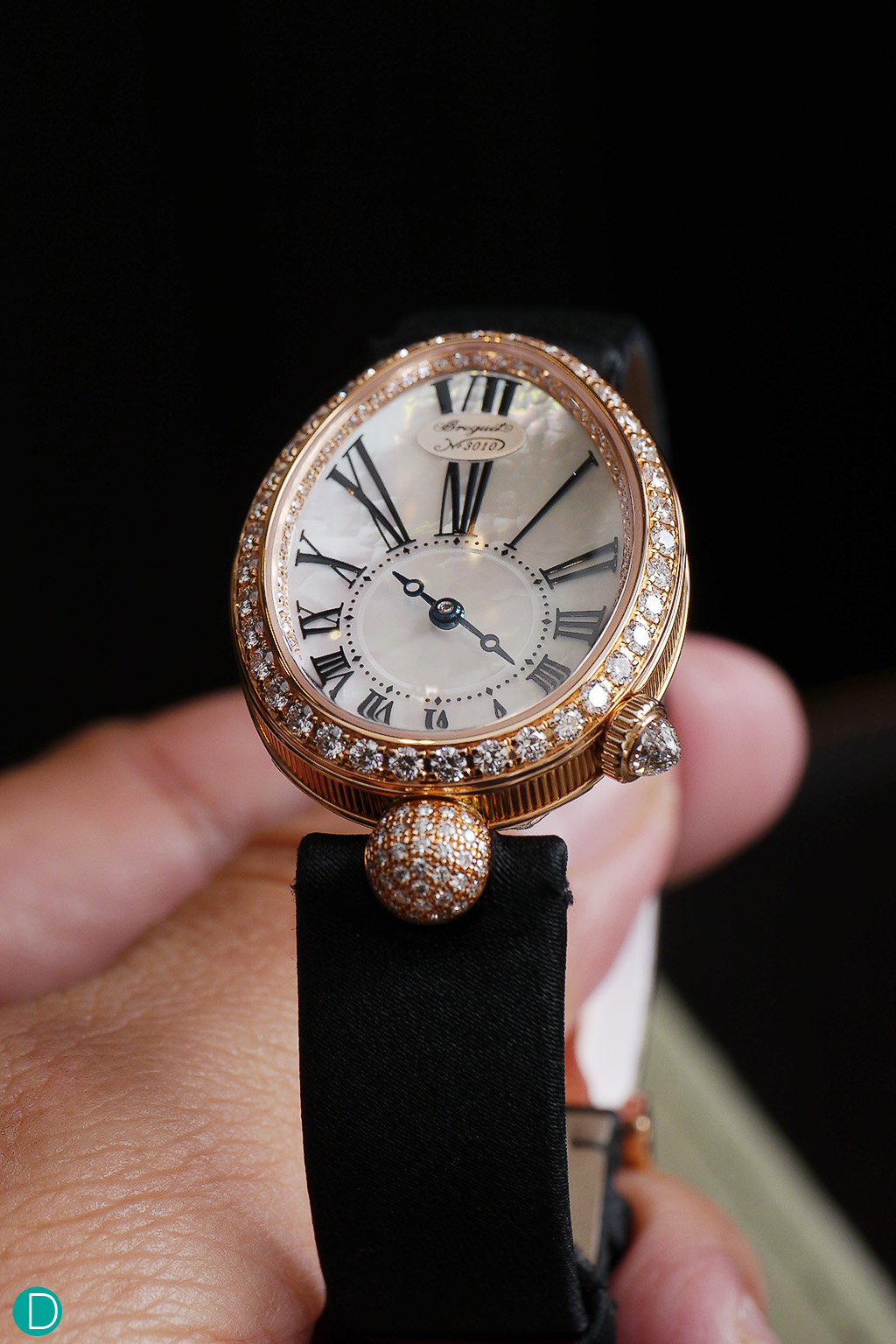 Breguet Reine de Naples' egg shaped case manages to be elegant while remaining understated, even when encrusted in diamonds.