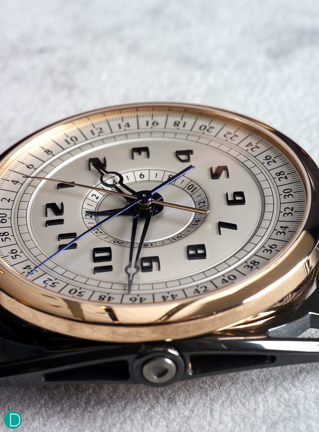 The more aggressively styled  De Bethune DB28 MaxiChrono with articulating lugs.  Note the beauty of the 5 hands, all coaxially mounted from the center of the dial. Note also that the dial is a complicated, multi level,, multi curved surface to maximise legibility. The chronograph measures up to a maximum of 23 hours, 59 mins, 59.9 seconds.