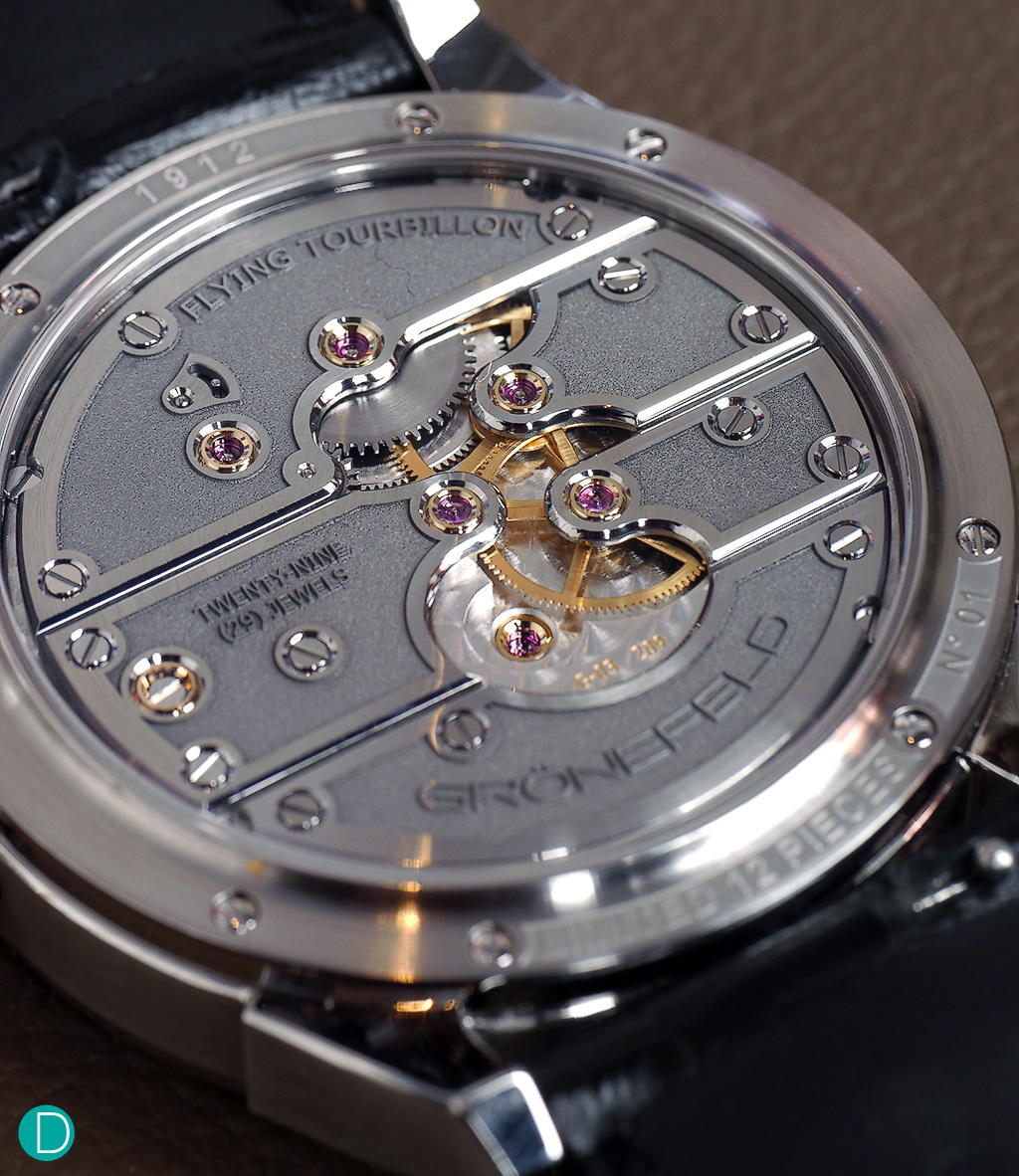 Grönefeld Caliber G-03, beating at 21,600 bph, 72 hours power reserve. Movement plates in stainless steel.