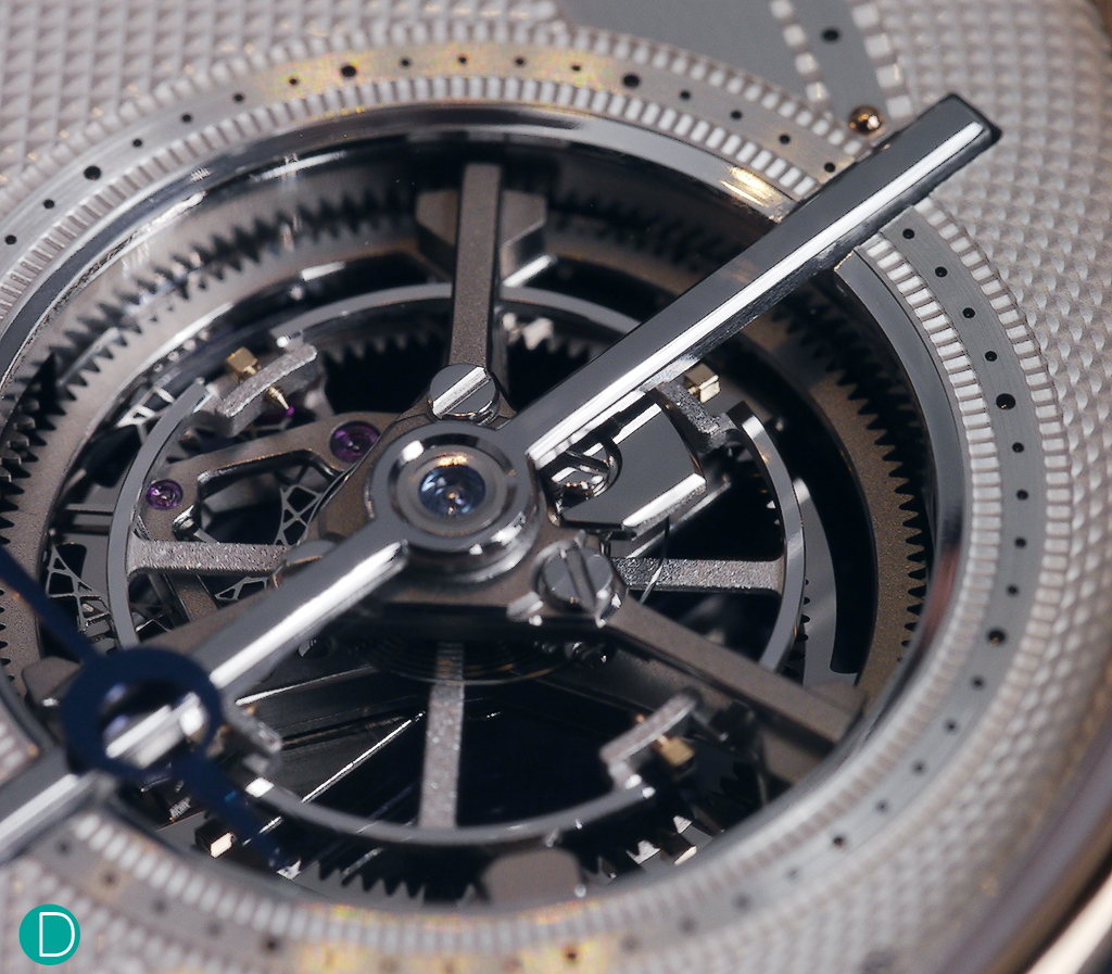 Detail of the tourbillon. Showing the beautiful finishing. Edges are polished nicely and catch the light, providing a sparkle, especially as the tourbillon cage goes around.