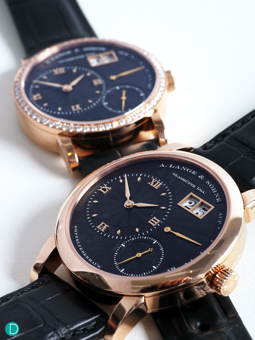This set of Lange 1 comes with a pink gold case, and a black guilloched  dial.