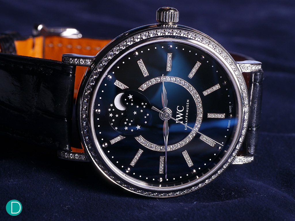 Mesmerizing moonphase display set against a deep blue dial, with diamonds to accent the rather sophisticated look.