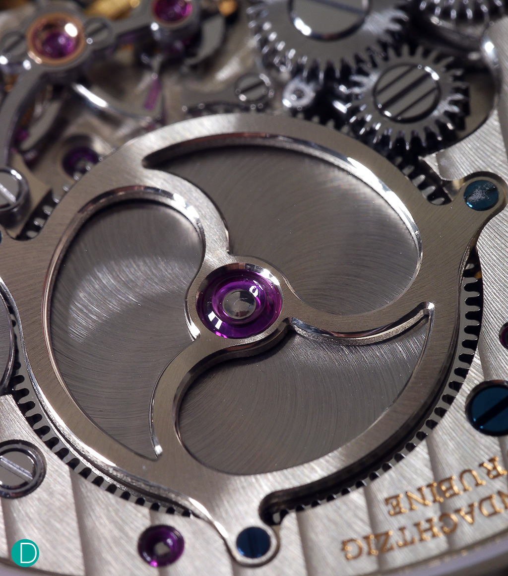 The mainspring barrel cover is now more elaborately decorated than in the original Zietwerk.  As the time keeping functions share the same barrel with the striking mechanism, an additional precaution, the watch is blocked from its striking function when the power reserve falls below 12 hours. 