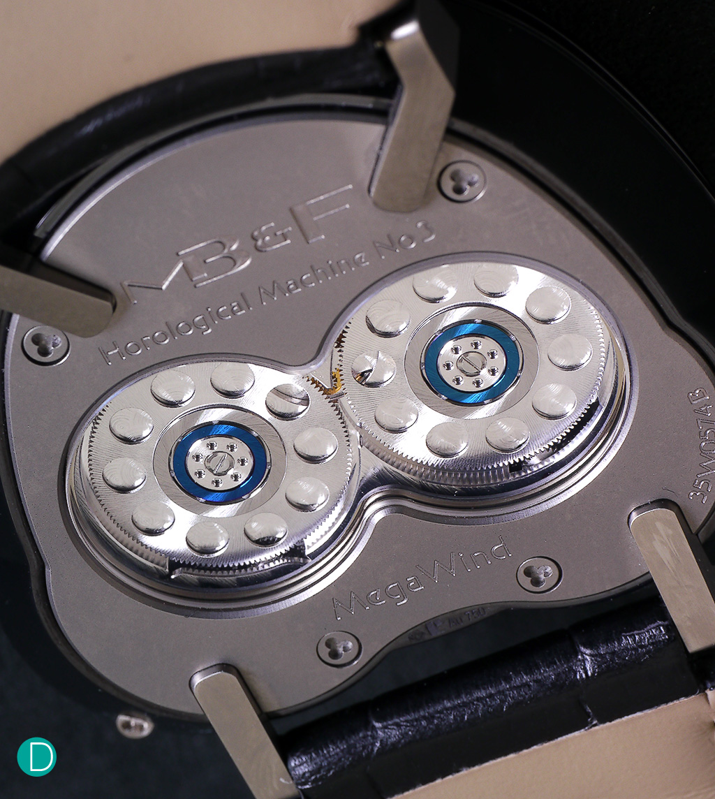 The HM3 Megawind movement. Visible from the case back are the two large ceramic bearings occupying most of the space. These bearings are very large diameter (15mm) to ensure minimal friction. And to ensure that the movement is not overly thick, is mounted flying...that is, it is only supported at the base as shown in the photograph.