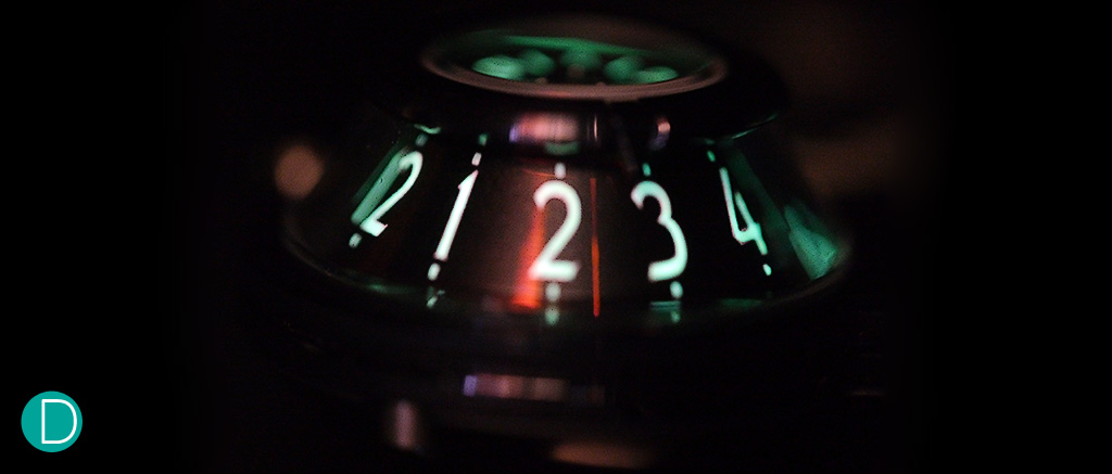 The lume: The trunkated cone of the hour dial is shown here, with the bright green glow of the Super LumiNova. 