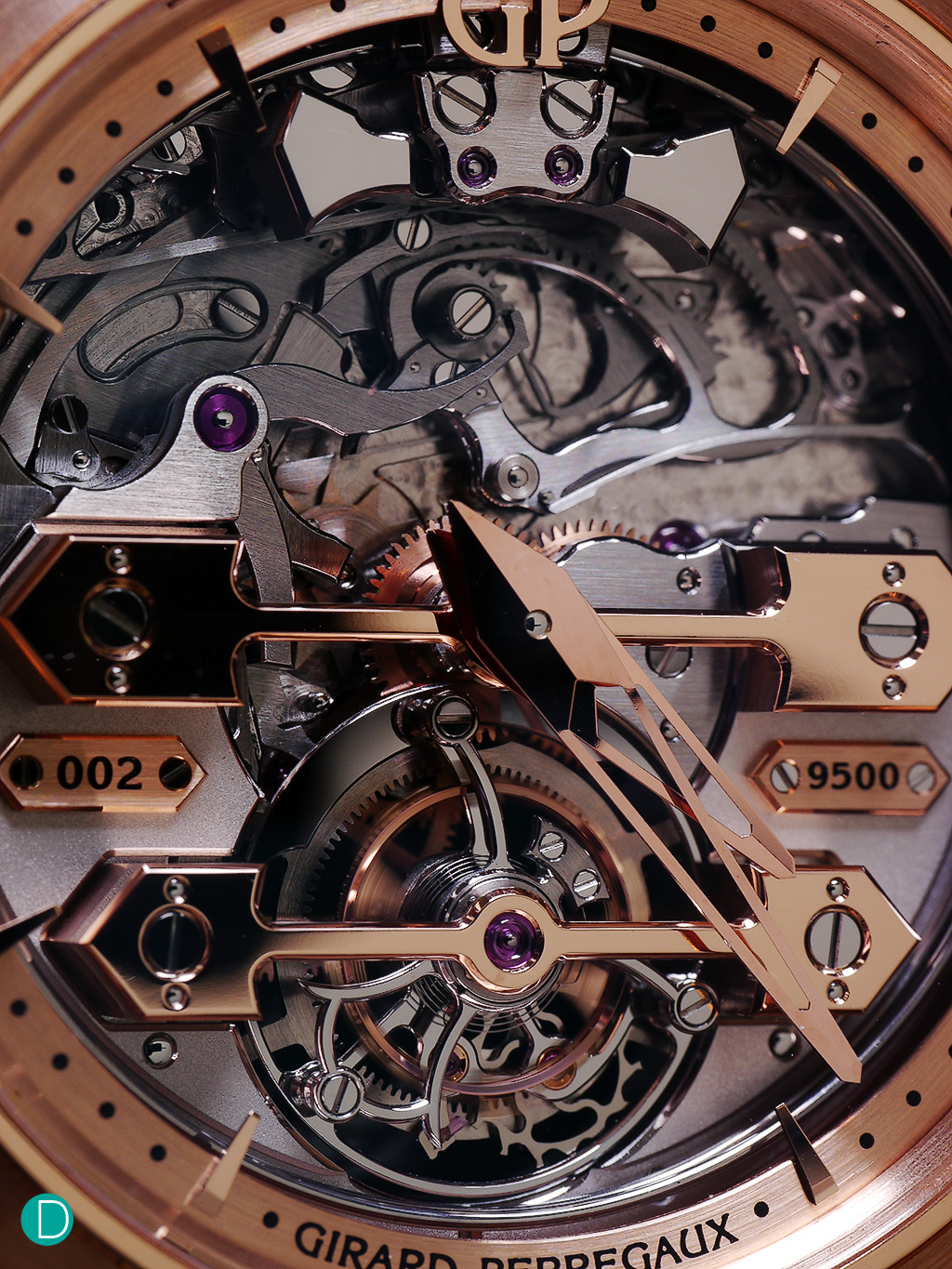 The GP 99820, two gold bridges in traditional GP fashion, and the third removed to show the racks of the striking mechanism.