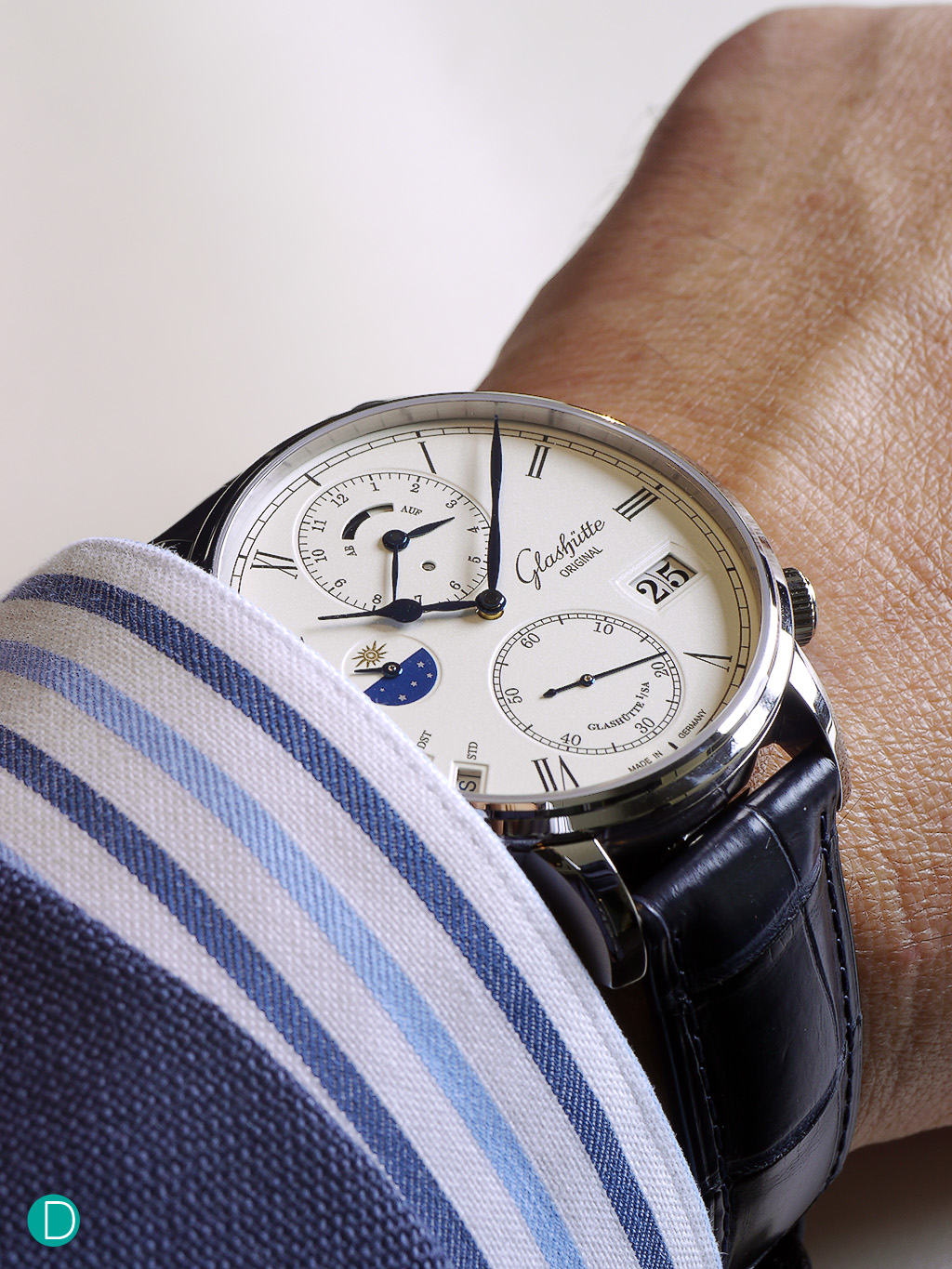 On the wrist, the 44mm case is perfect, and slips under the cuff easily and sits comfortably on the wrist. 