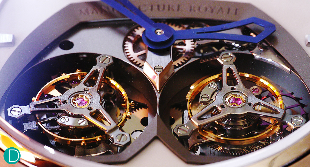 The double tourbillons. The left tourbillon makes one revolution every 6 seconds (fast!!) and the right one is a regular one minute tourbillon.