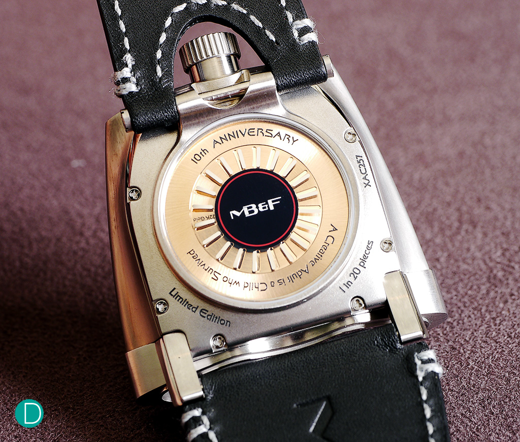 MB&F HMX movement case back. Showing the 22k automatic winding rotor, 42 hours power reserve beating at 28,800 bph.