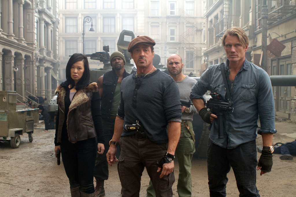 Maggie (Yu Nan, front left), Barney Ross (Sylvester Stallone, front center), Gunner Jensen (Dolph Lundgren, front right), Hale Caesar (Terry Crews, back left) and Toll Road (Randy Couture, back right) in THE EXPENDABLES 2. Photo credit: Frank Masi