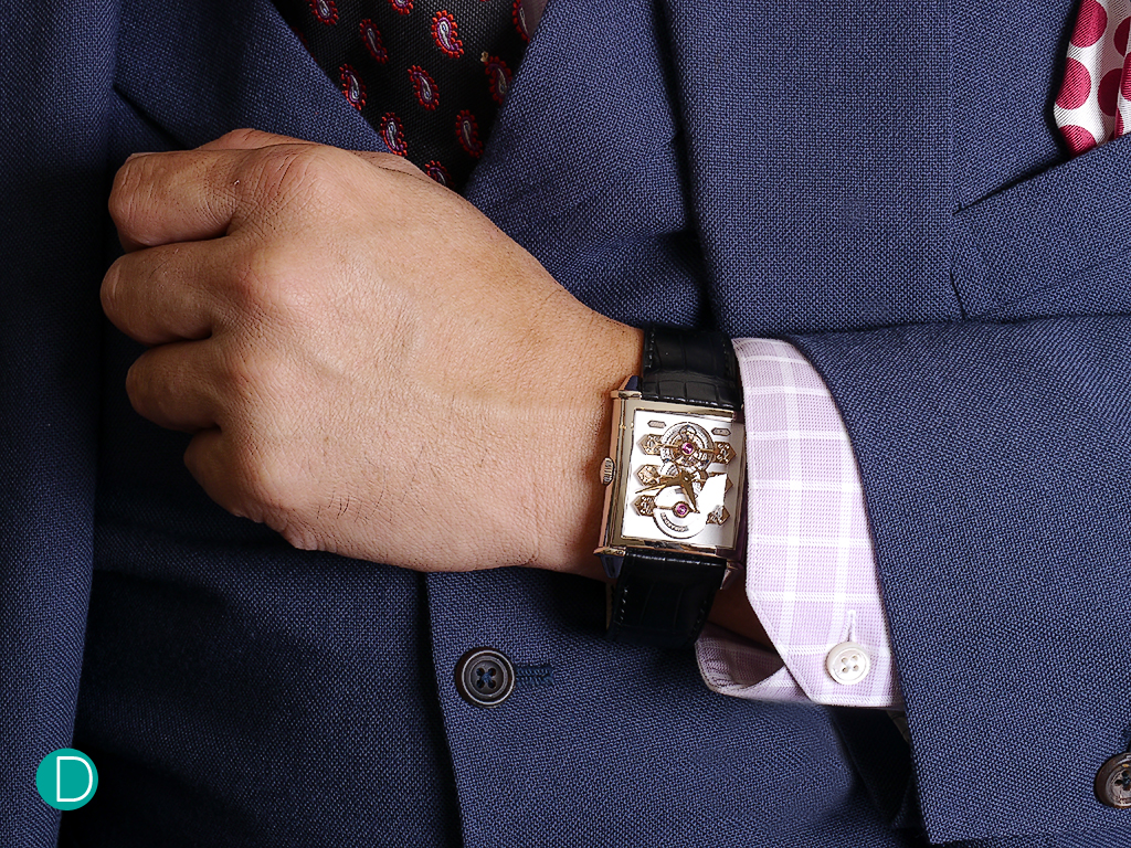 The GP Vintage 1945 Tourbllon with Three Golden Bridges on the wrist. The coat and waistcoat is bespoken and made by Gordon Yao from a limited edition run of a fresco like fabric known as Brisa. Note that as the paisley pattern on the tie is reflected in the polka dots on the pocket square, they are of a similar scale. Shirt is also bespoked, Thomas Mason oxford cotton in a pale lavender hue with a white over check, and mother of pearl buttons.