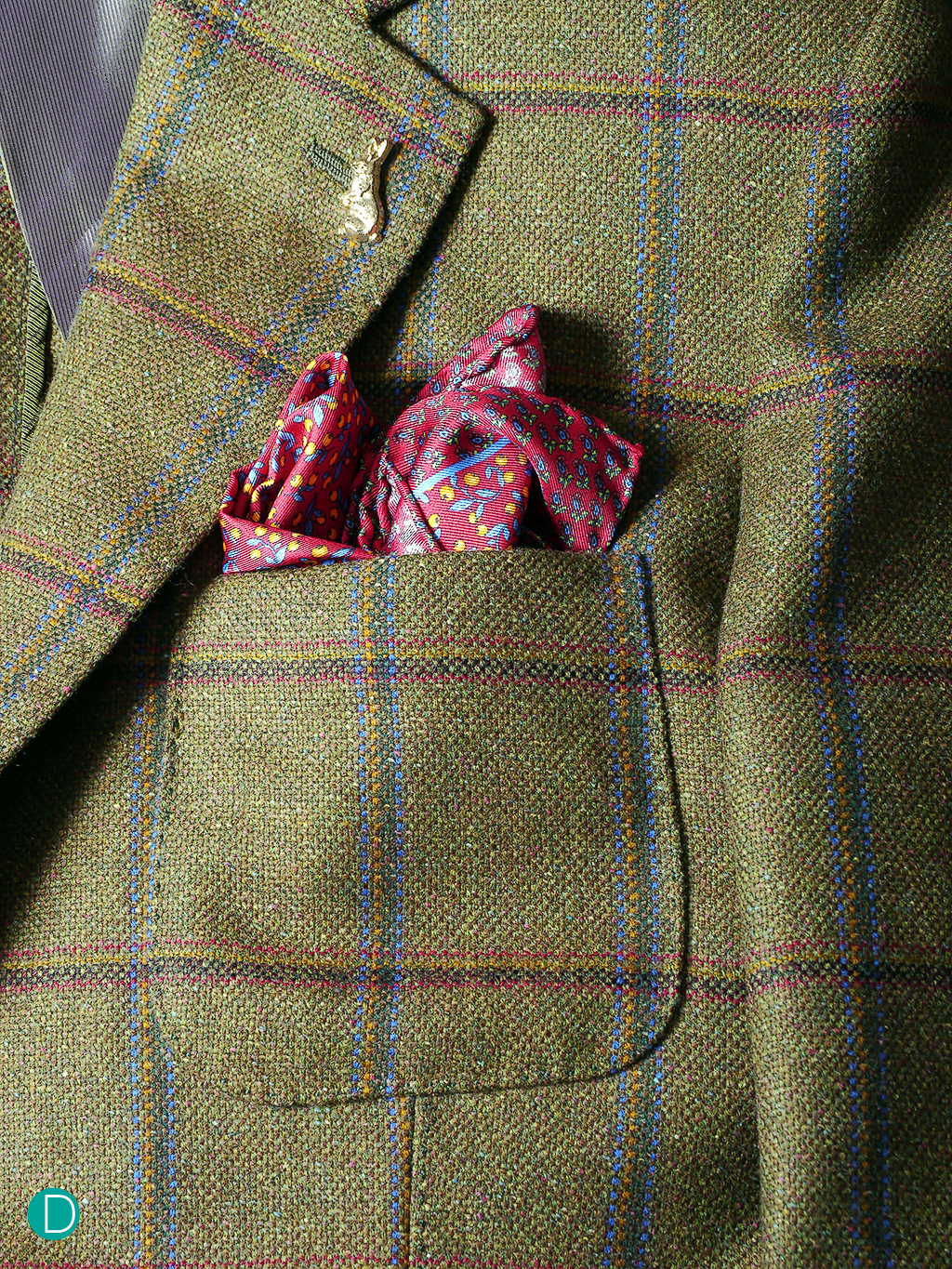 The revers are but in a slight curve, accentuating the line. Note the patch breast pocket which is slightly curved at the mouth and larger at the bottom. This gives the pocket an internal volume and enables it to take a pocket square nicely.