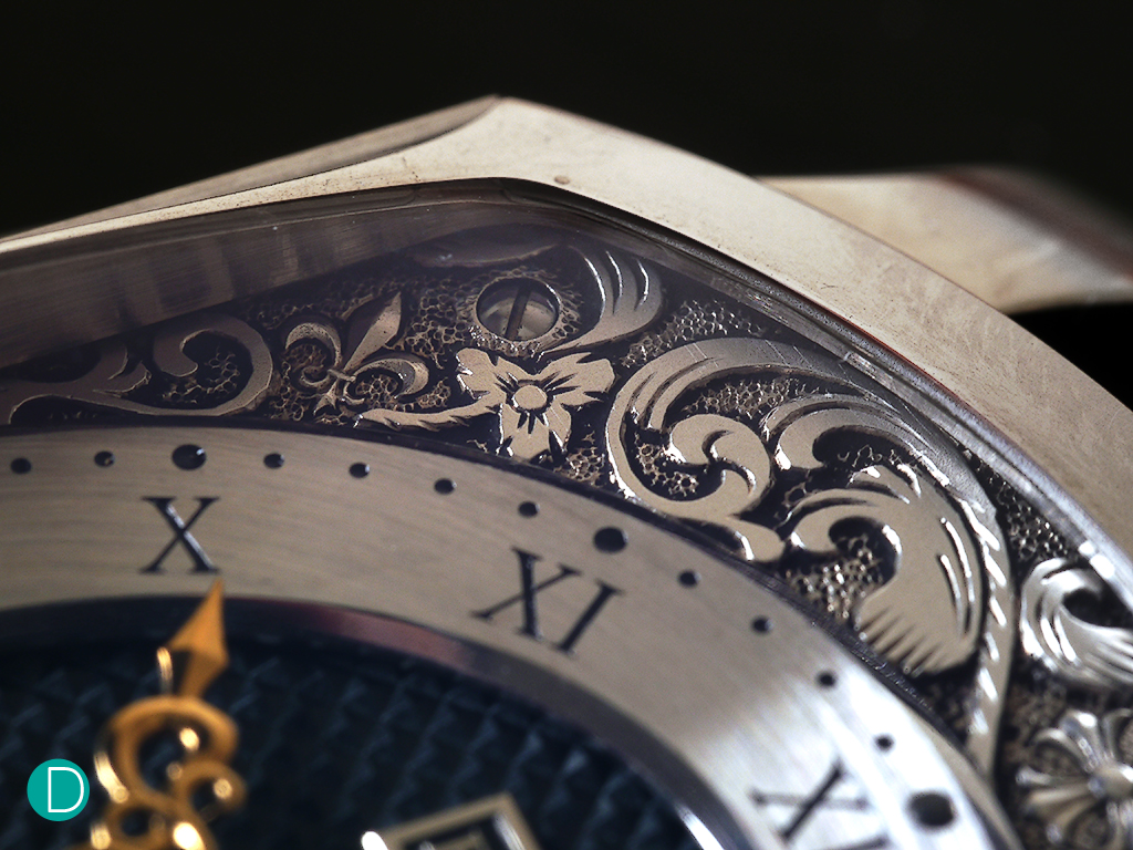 Dial detail, showing the hand engraved dial motifs which are inspired by the motif on the Chrome Hearts jewellery.