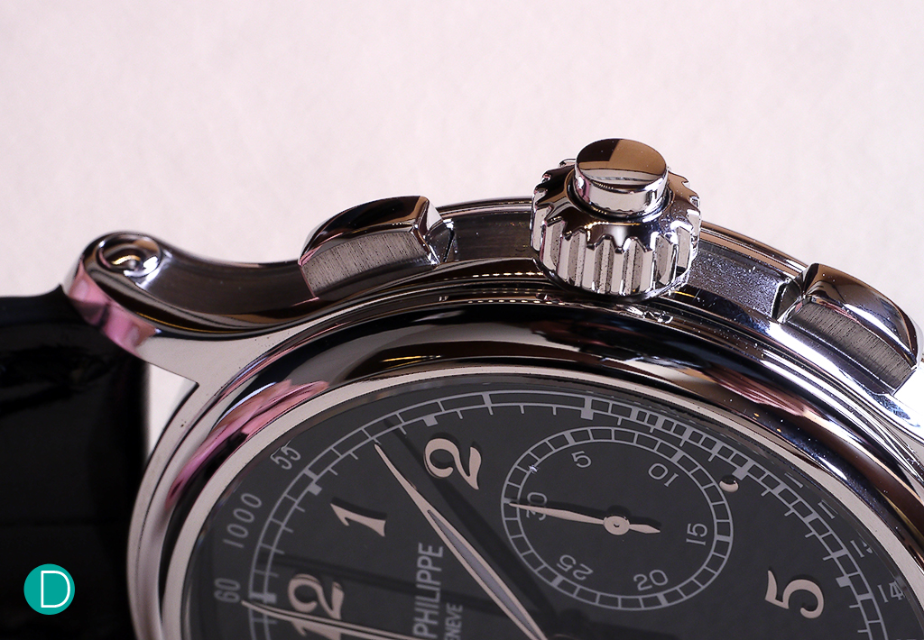 Patek Philippe 5370 case side detail showing the sensuous curves of the lugs and the pushers. Note the coaxial pusher on the crown.