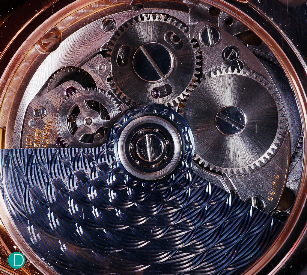 The automatic movement is from an sourced ebauche, but upgraded by Andersen Genève with time zones complication module developed and produced in the atelier Rotor: "BlueGold" 21ct hand guilloché.