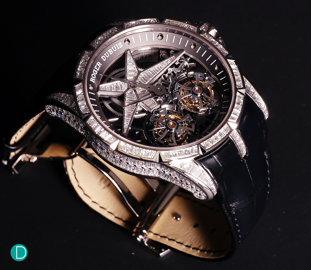 The Roger Dubuis Star of Infinity. The jewel setting is very fine, and a huge number of carats lavished on a double tourbillon makes this a very extravagant, over the top bold watch. Catch phrases which Roger Dubuis use to describe herself. 