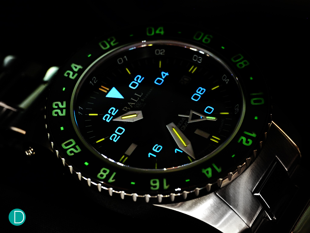 Ball Engineer Hydrocarbon AeroGMT in the dark, showing the various colors of the micro gas discharge tubes.