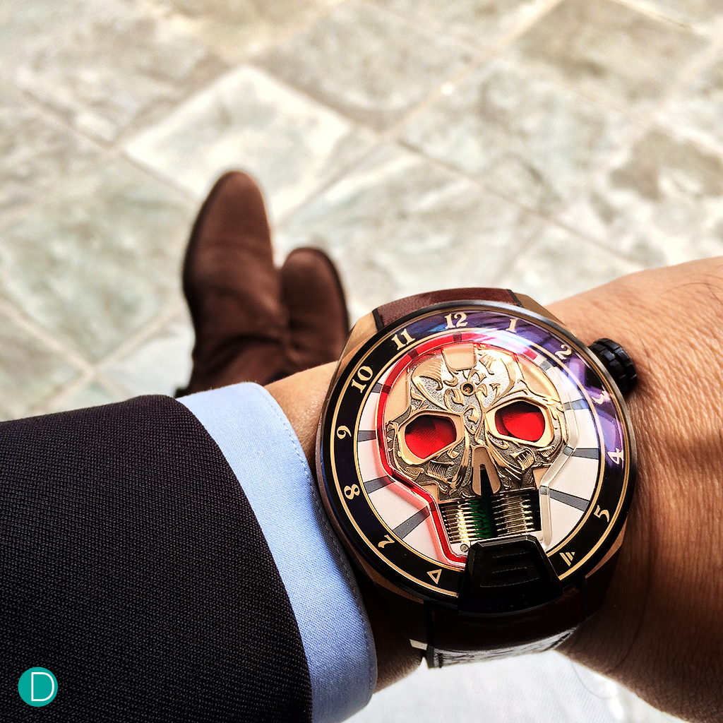 On the wrist, it is rather large...well, its 50mm case diameter, but every inch up to the task under the shirtsleeve of a suited gentleman. 