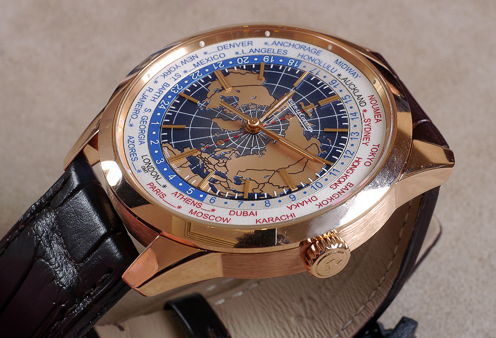 JLC Geophysic Universal Time in pink gold. The dial features an engraved motif of the map of the Earth. continents in pink gold, and a magnificent blue lacquer for the oceans.
