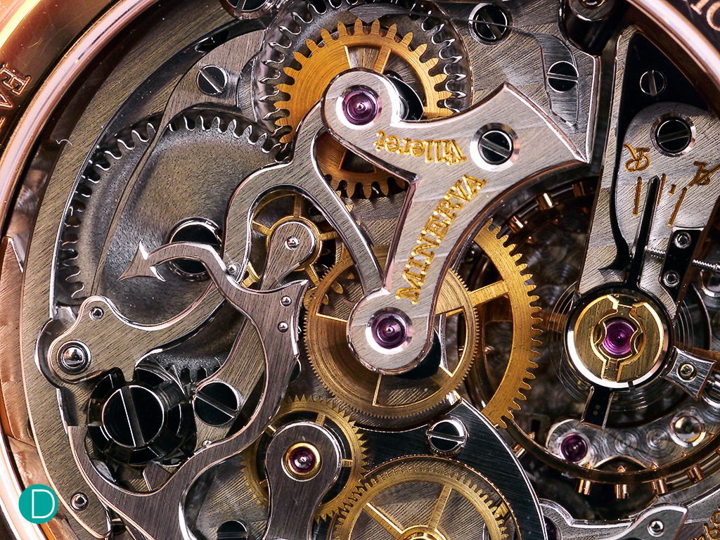 The business side of the chronograph movement, showing the horizontal clutch system and the column wheel. The Devil;s tail can be seen at about 9 o'clock.