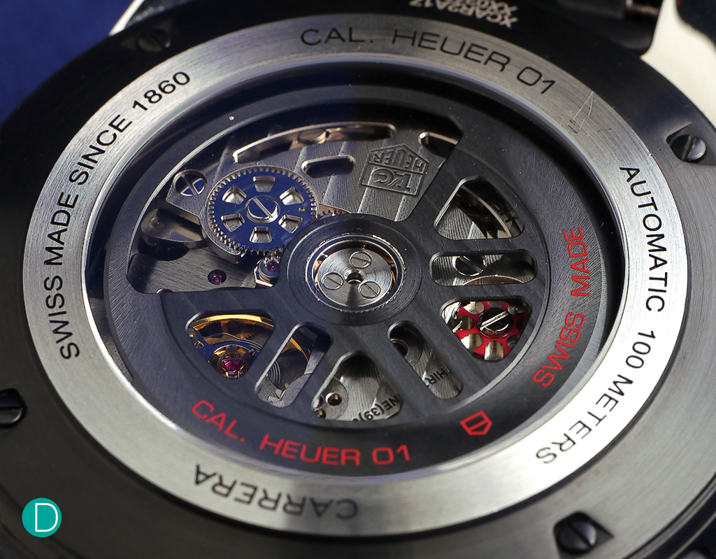The Heuer 01 movement. Interestingly, TAG has chosen to color code some parts of the movement. The column wheel is in red, and the intermediate wheel winding the barrels from the rotor is blue.