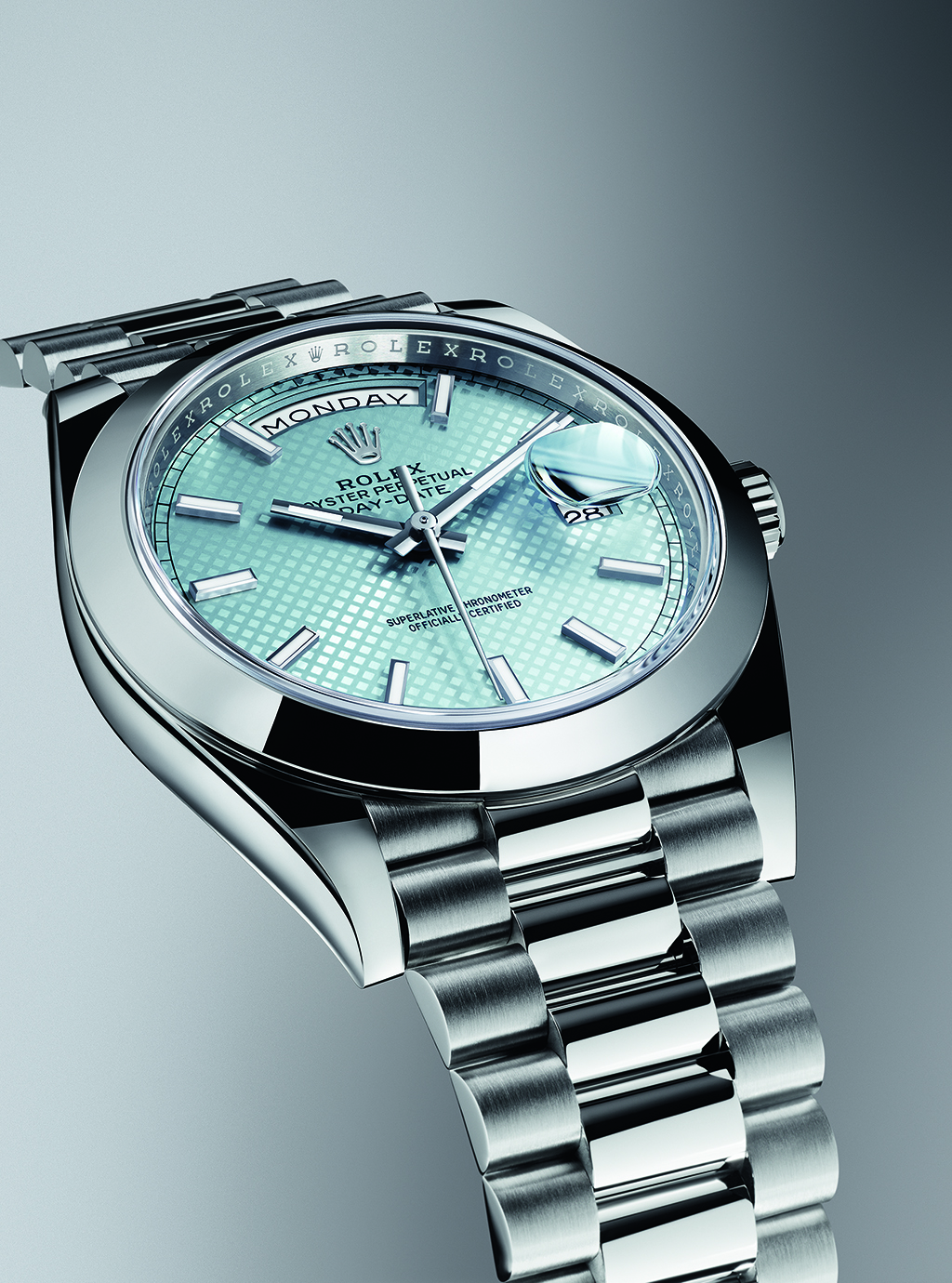 Rolex Oyster Perpetual Day-Date 40 in platinum with an ice blue dial with diagonal motif on sunray finish.