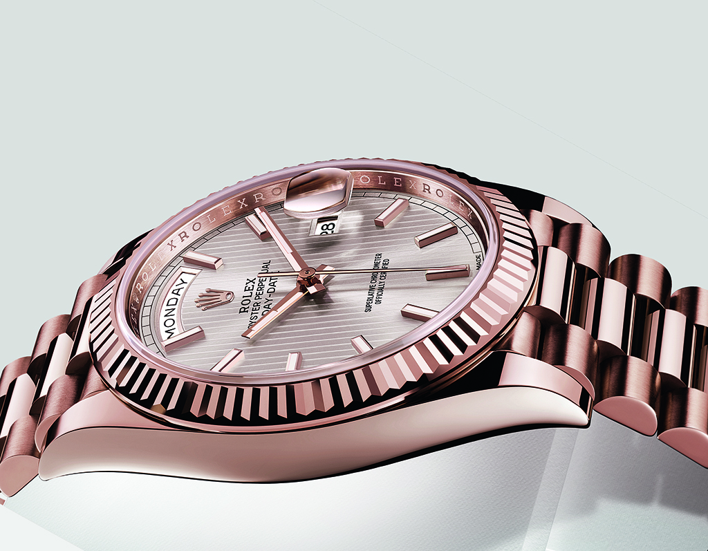 The Day-Date 40 in Everose...a special pink gold created by Rolex. Dial is stardust with stripe motif on sunray finish.