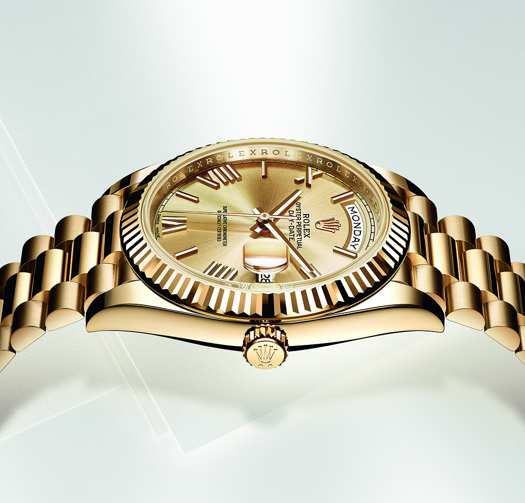 In yellow gold, the Day-Date 40 comes with a champagne dial with sunray finish.