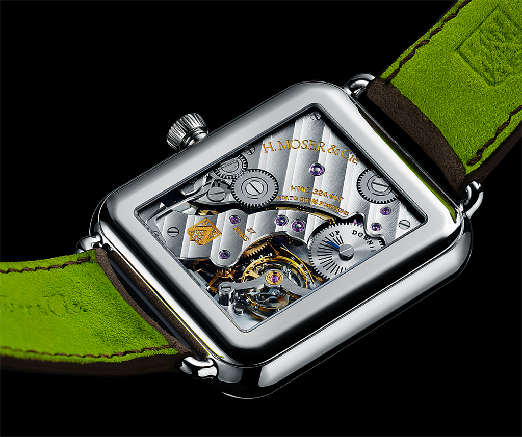 The movement is a traditional mechanical movement. the Moser manufactured Reference 8324-0200.