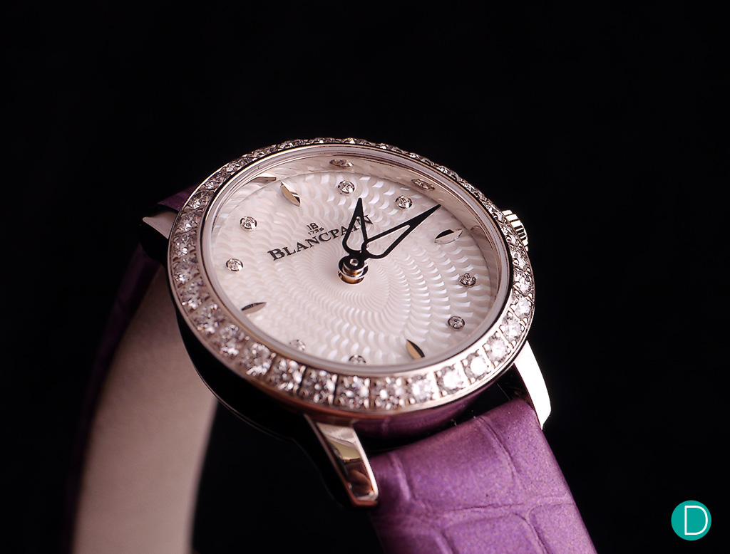 The Blancpain Ladybird's 60th anniversary edition, beautifully decorated with diamonds and features a lovely mother-of-pearl dial.