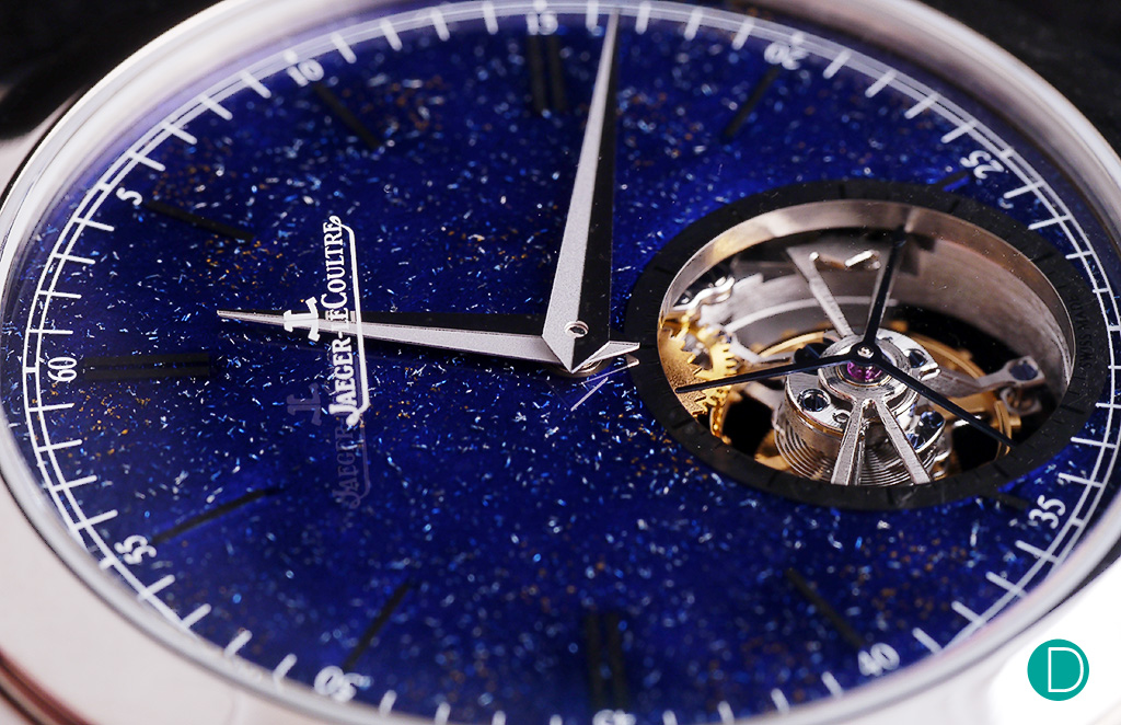 The dial is a special execution where gold and silver shavings are sprinkled on transparent blue enamel.