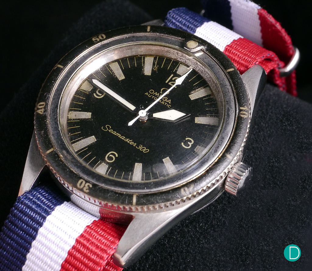 The second generation CK 2913, with the revised sword/dagger hands. Here the owner has fitted it with a NATO strap with French tricolour.