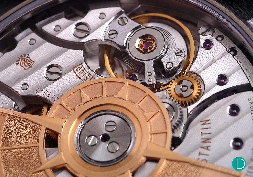 The movement is nicely decorated, and the gold rotor engraved with compass markings is most apt and appropriate.