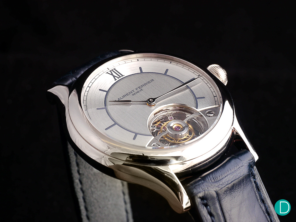 Not many changes were noticed on the dial except for the inclusion of a tourbillon cage at the bottom of the dial.